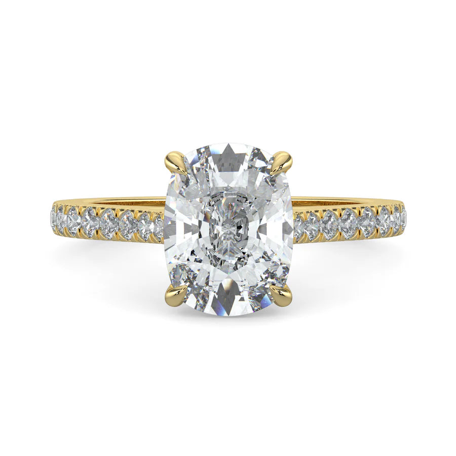 A gold lab diamond ring featuring small diamonds on the band and a larger central diamond of oval shape in four prong setting.