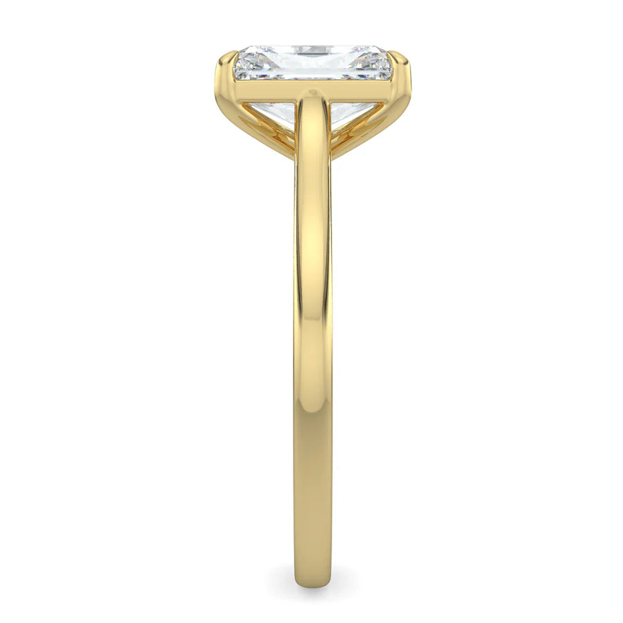 Side view of a yellow lab diamond ring in featuring a polished band and a larger central diamond of round cut in a four-prong setting