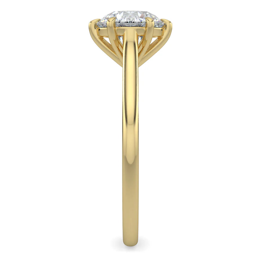 Top view of a cathedral-style solitaire engagement ring in yellow gold, featuring a round white diamond centerpiece held by four prongs.