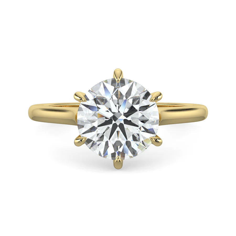 Side view of a white gold engagement ring with 6 prong.