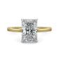 Top view of a yellow gold lab diamond ring featuring a polished band and a larger central diamond of round cut in a four-prong setting.