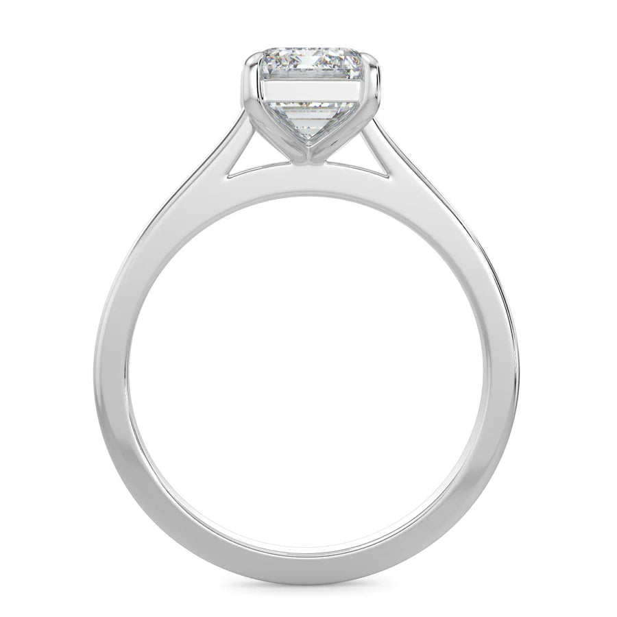 Front view of a silver lab diamond ring with polished band in four prong setting.