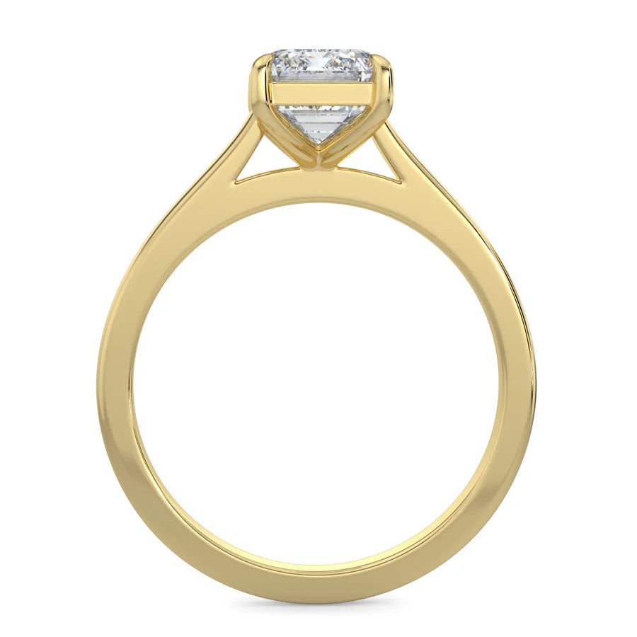 Front view of a gold lab diamond ring with polished band in four prong setting.