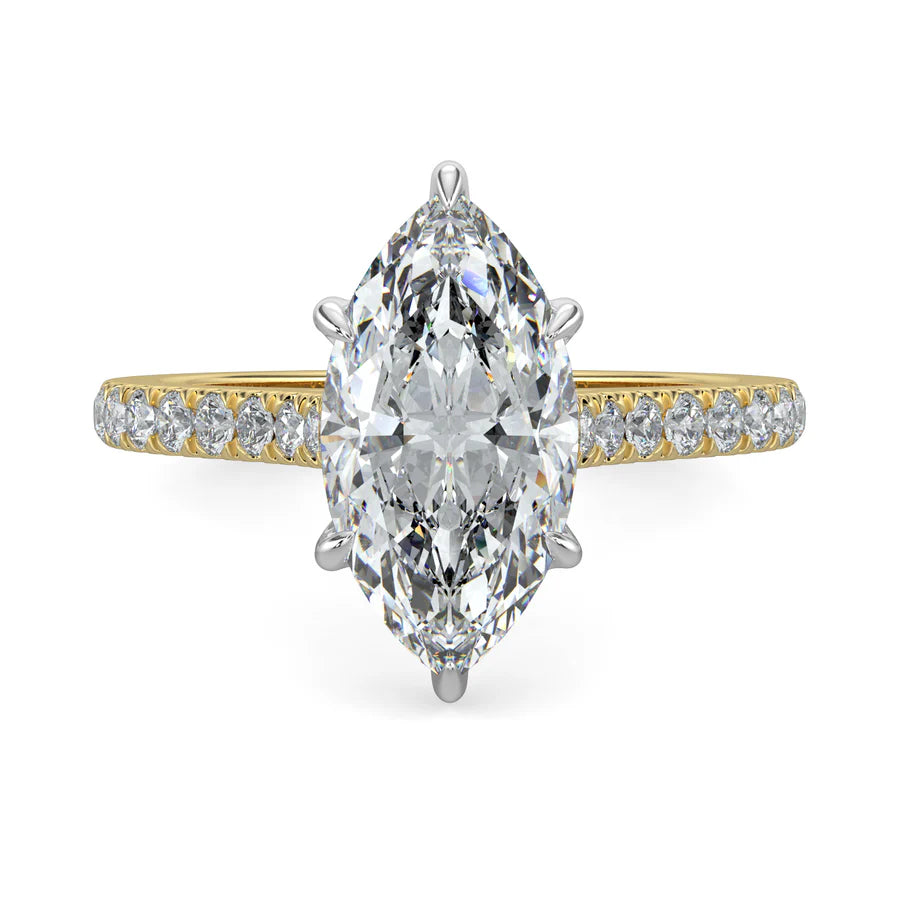 A gold lab diamond ring featuring small diamonds on the band and a larger central diamond of pear shape in silver color six prong setting.