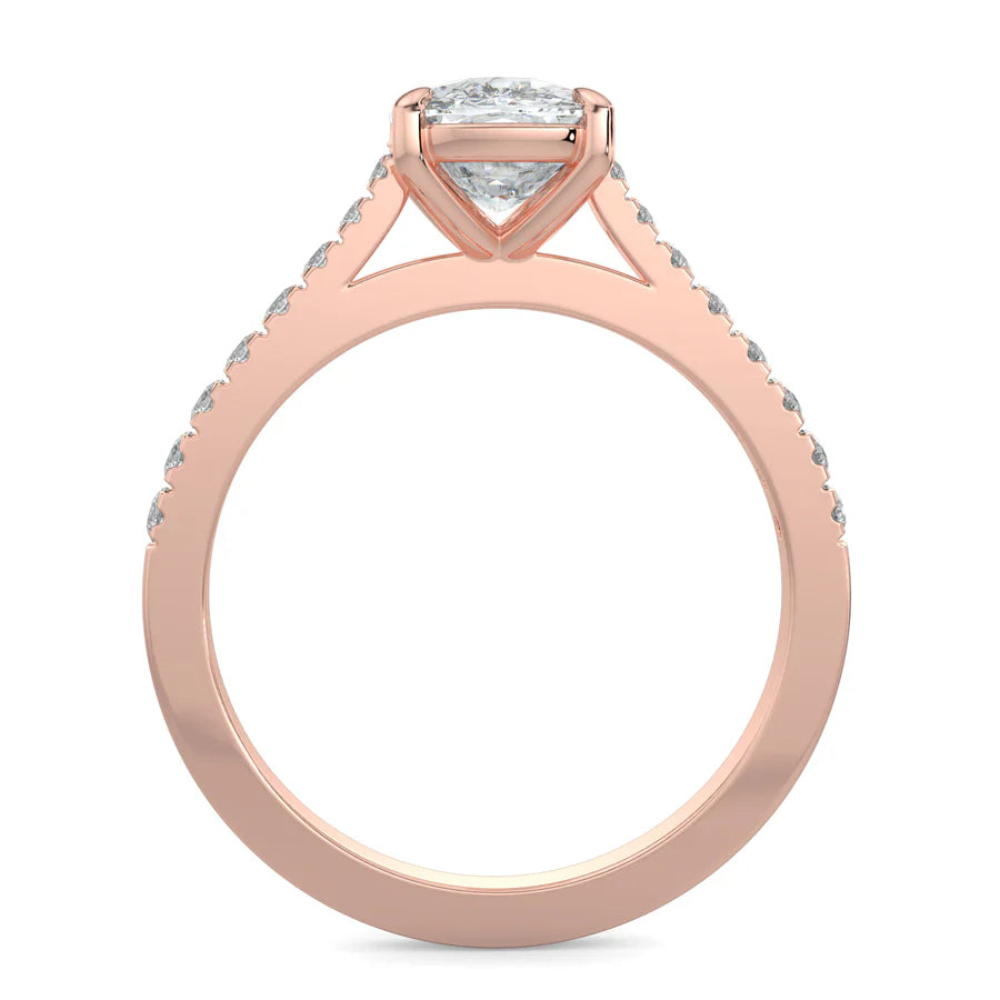 Front view of a rose gold solitaire lab diamond engagement ring featuring a round cut diamond in four-prong setting.