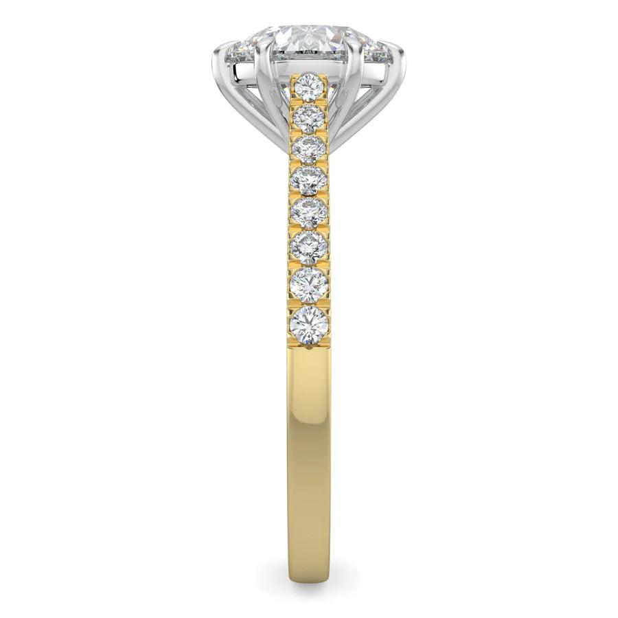 Side view of a round lab diamond ring in gold color featuring small diamonds on the band and a larger central diamond in silver color six prong setting.