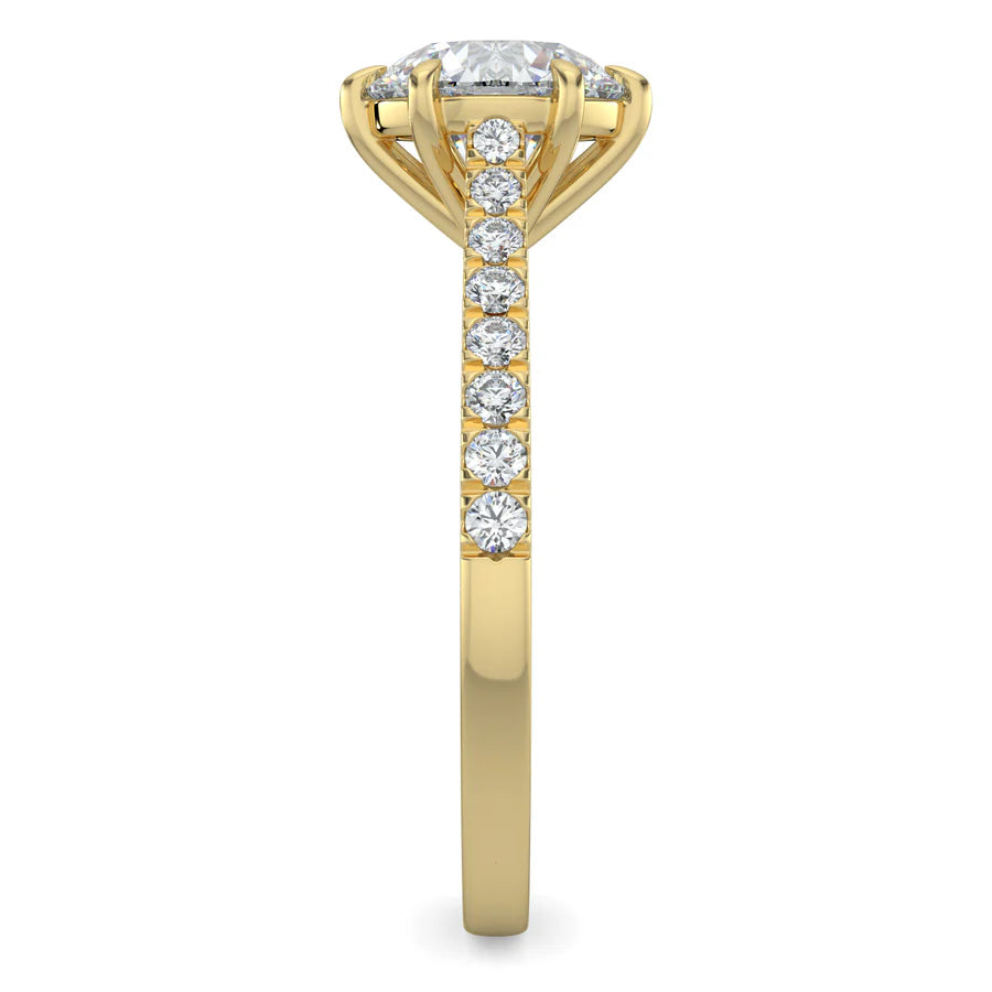 Side view of a round lab diamond ring in gold color featuring small diamonds on the band and a larger central diamond in six prong setting.