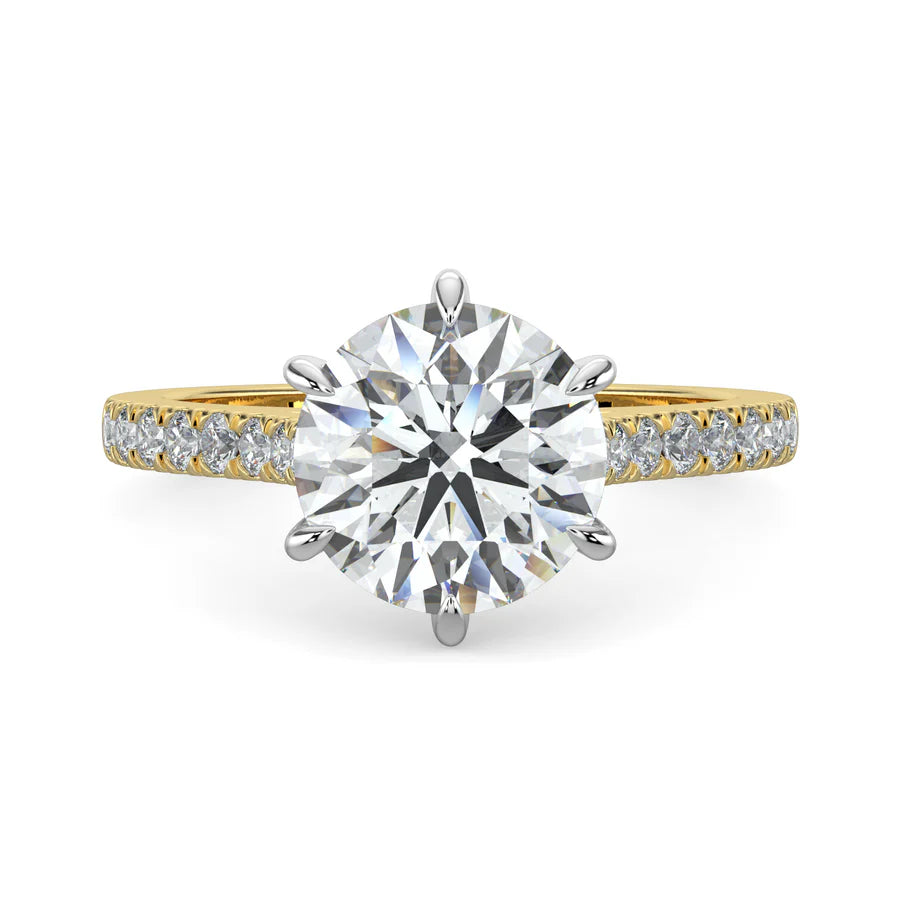 A round lab diamond ring in gold color featuring small diamonds on the band and a larger central diamond in silver color six prong setting.