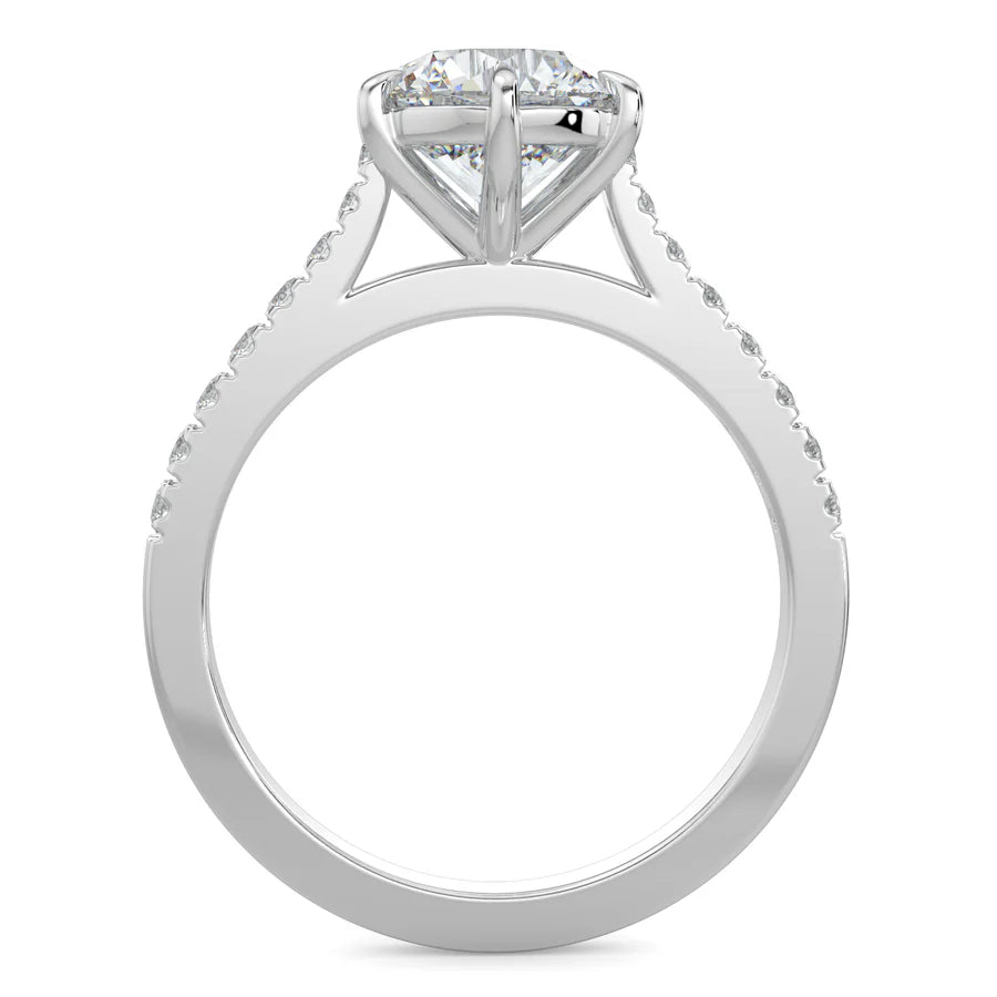 Front view of a round lab diamond ring in silver color featuring small diamonds on the band and a larger central diamond in six prong setting.