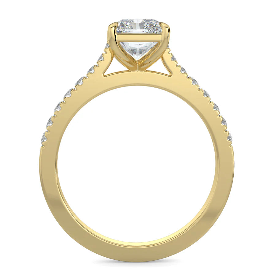 Front view of a gold lab diamond ring featuring small diamonds on the band and a larger central diamond in four prong setting.