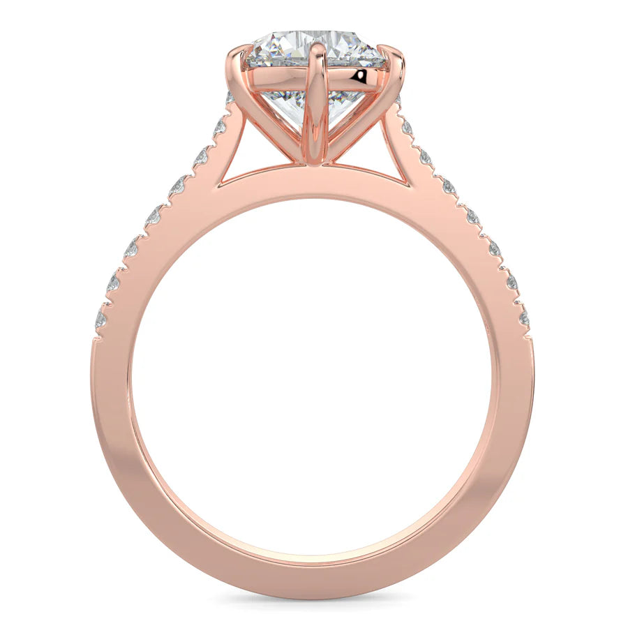 Front view of a round lab diamond ring in rose gold color featuring small diamonds on the band and a larger central diamond in six prong setting.