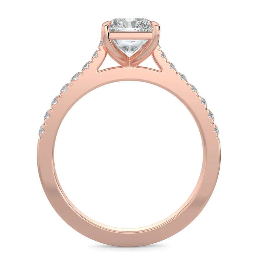 Front view of a rose gold lab diamond ring featuring small diamonds on the band and a larger central diamond in four prong setting.